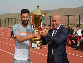 The team of the department of sports won the football tournament 